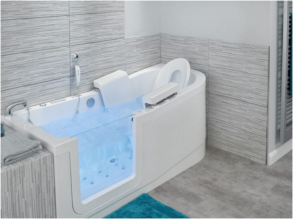Easy Riser walk in bath with powered lifting seat and assistive back support. The Easy Riser bath is entered via a wide glass door that opens inward.